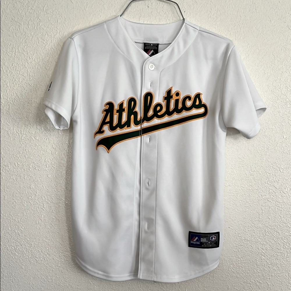 Majestic White Athletics Replica Jersey. Girls medium 10-12.
Worn once.